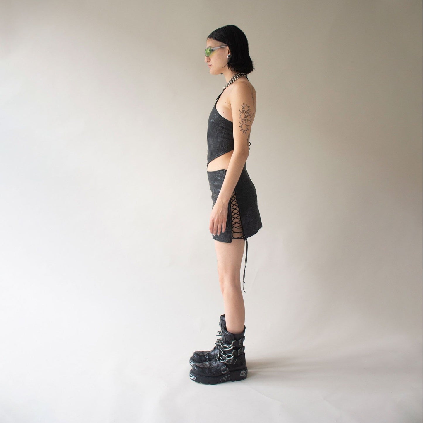 Black pvc skirt with black snake pattern