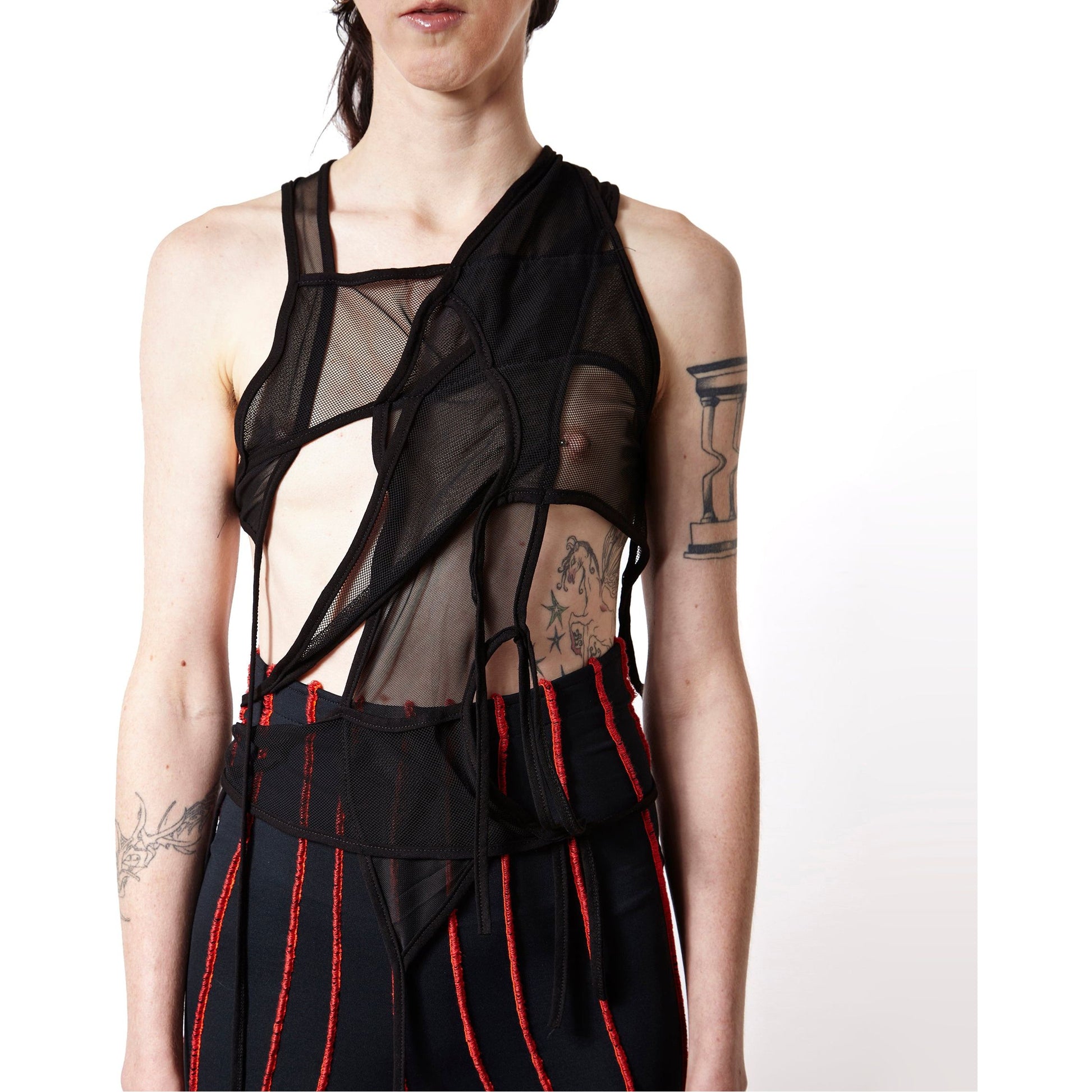 Top deconstructive with 2 mesh fabric in black color and bies in jersey,