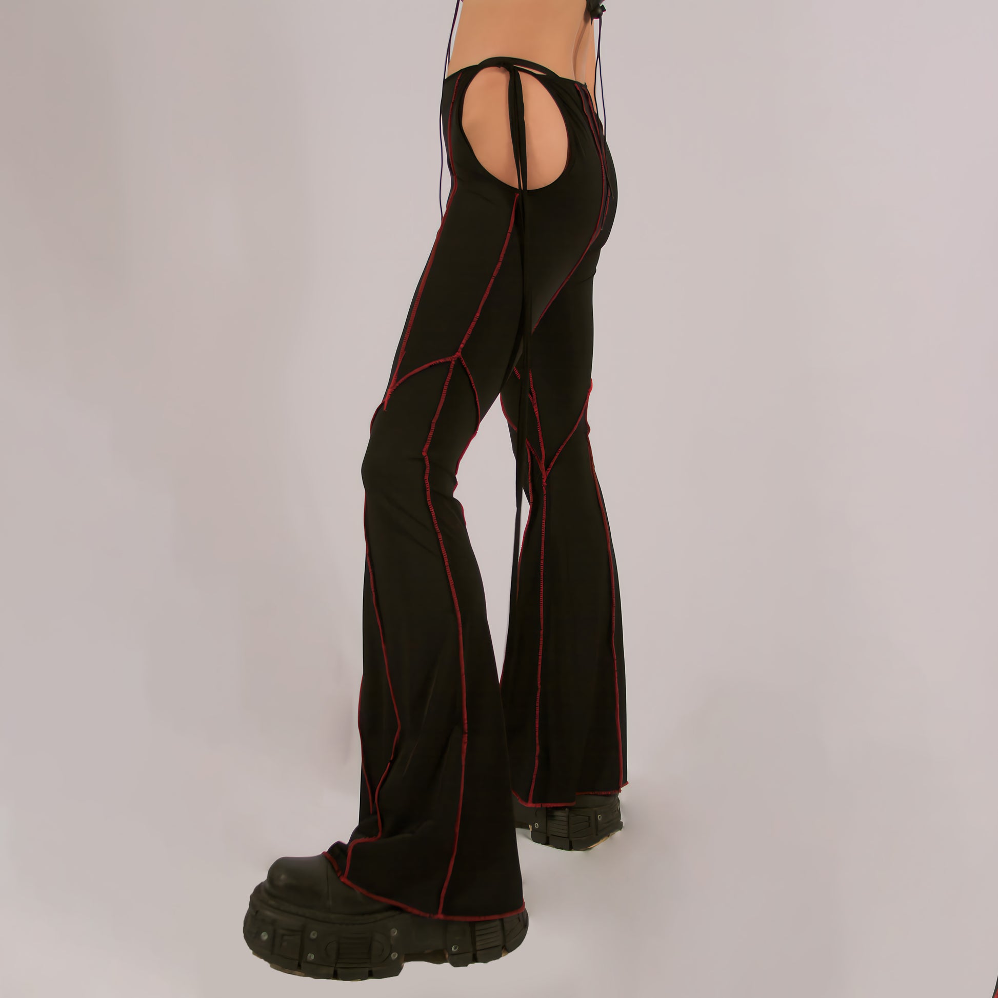 Black rave pants - Soft Lycra visible seams in red color, super easy an very confortable fit, elasticized fabric adjusts at the waist with ties